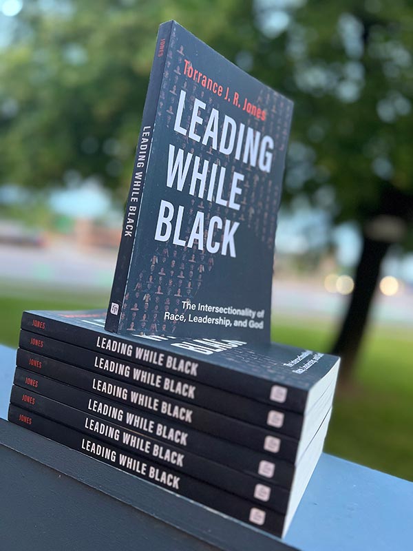 A stack of Houghton professor Torrance Jones' book Leading While Black.